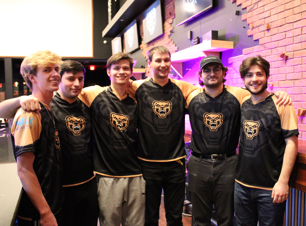 Oakland University Rocket League Roster lined up with arms around eachother